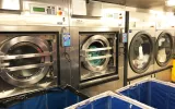 How to maximise operational equipment efficiency using commercial laundry software